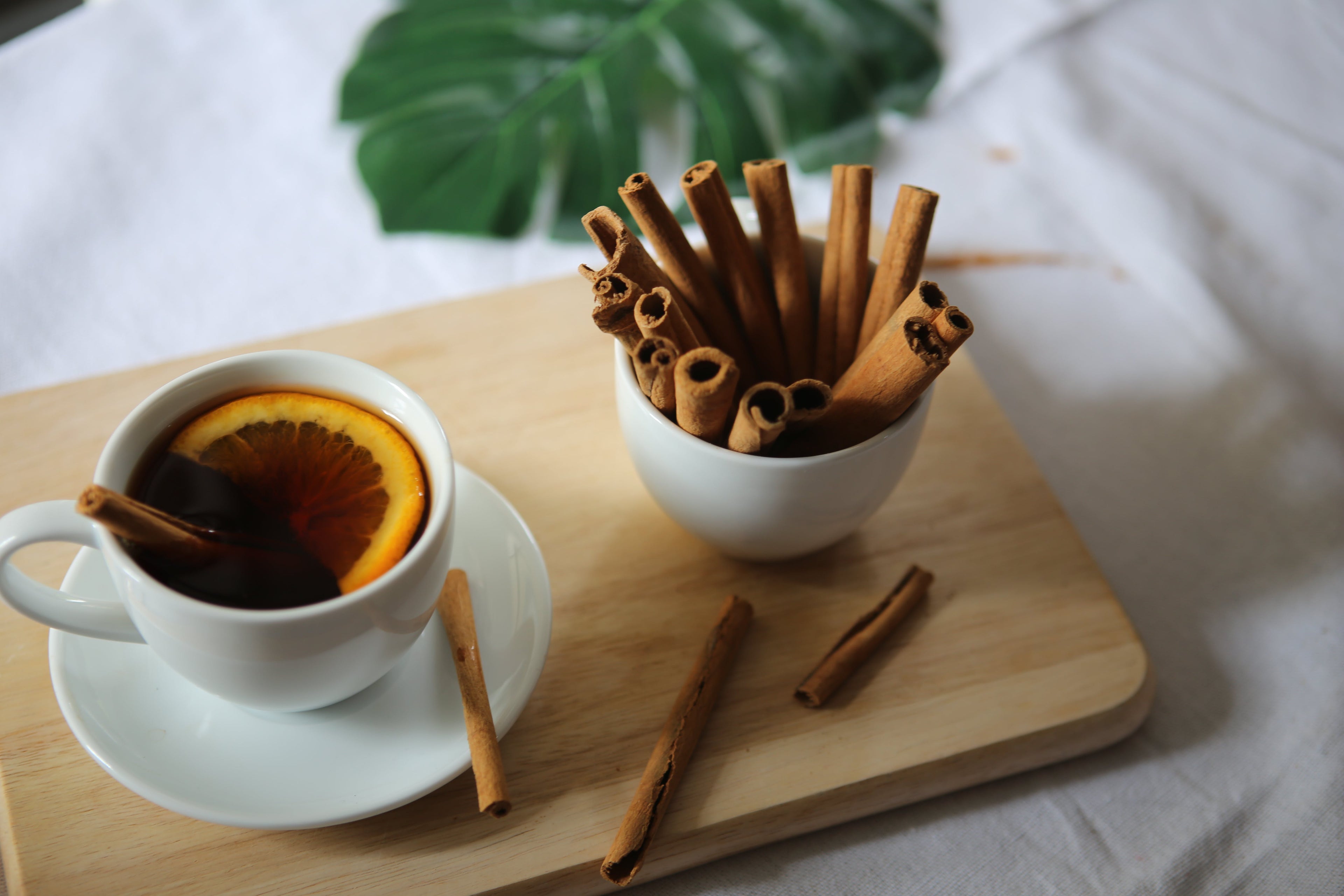 Cinnamon sticks and cup of tea